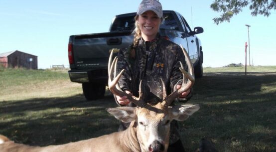 Woman archery whitetail photo