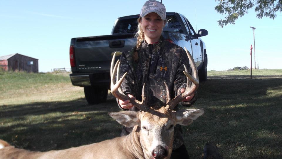 Woman archery whitetail photo